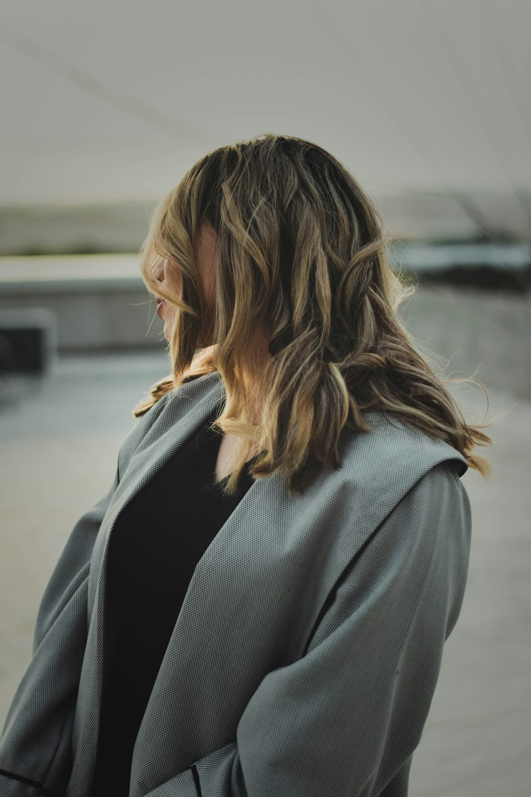 Woman over 40 with soft shoulder length layers